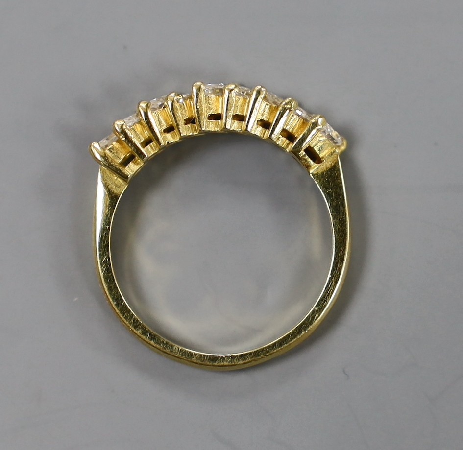 A modern 18ct gold and nine stone marquise cut diamond set half hoop ring, size O, gross weight 4.2 grams